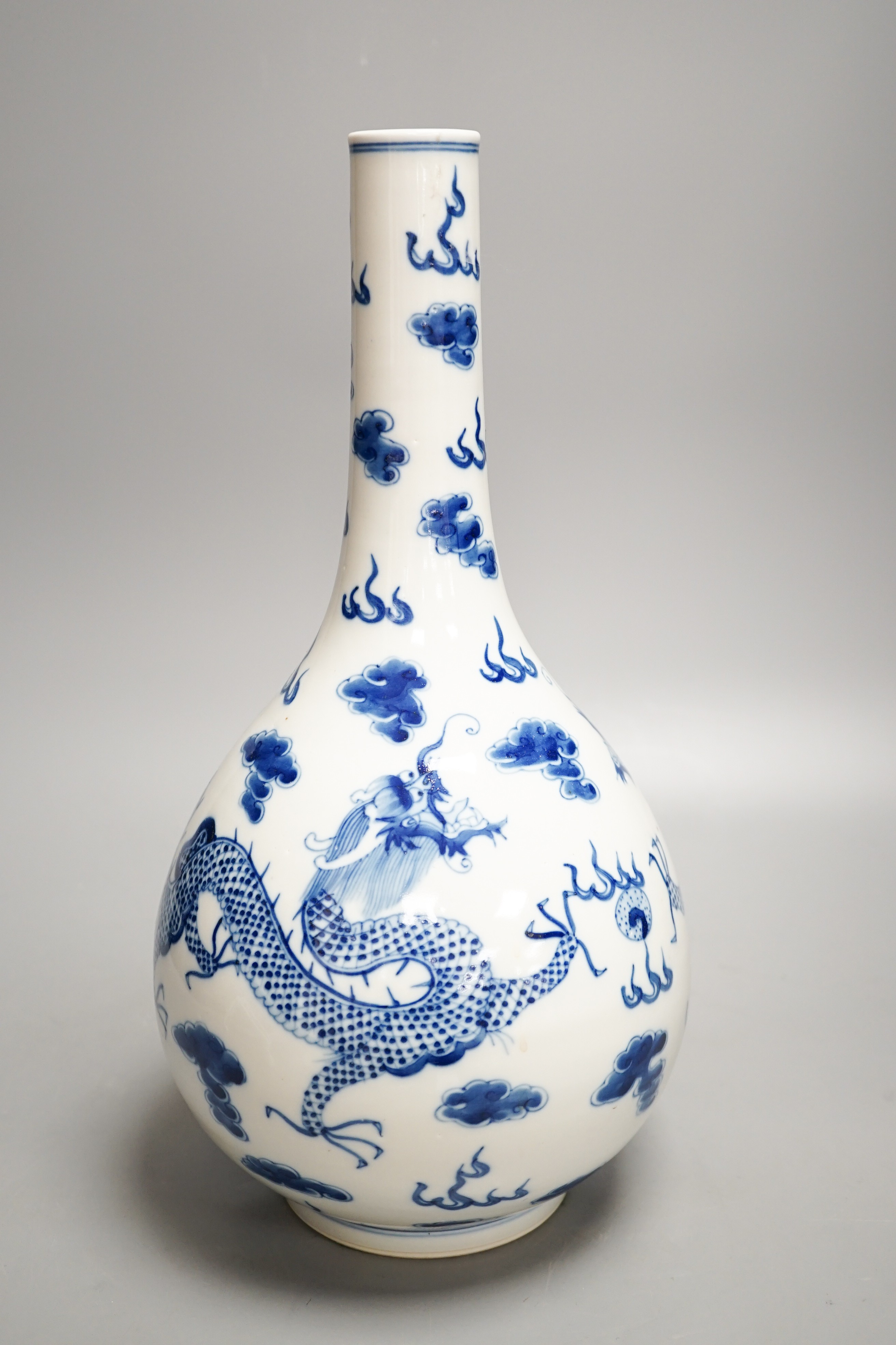 A Chinese blue and white ‘dragon’ bottle vase 36cm